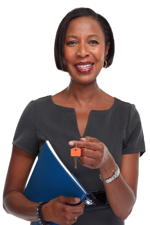 A realtor smiling and holding a folder in one hand and a set of house keys in the other
