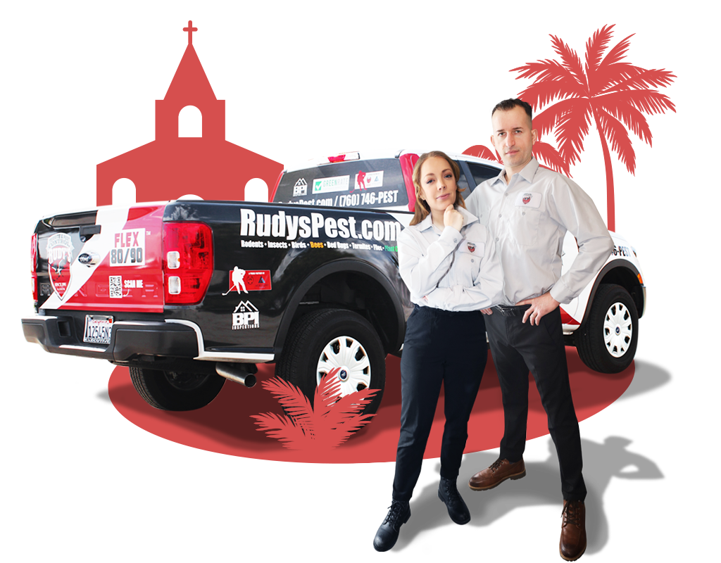 Employee smiling in front of a Rudy's Pest Control Vehicle.