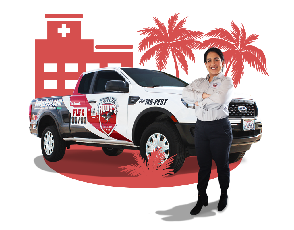 Employee smiling in front of a Rudy's Pest Control Vehicle.